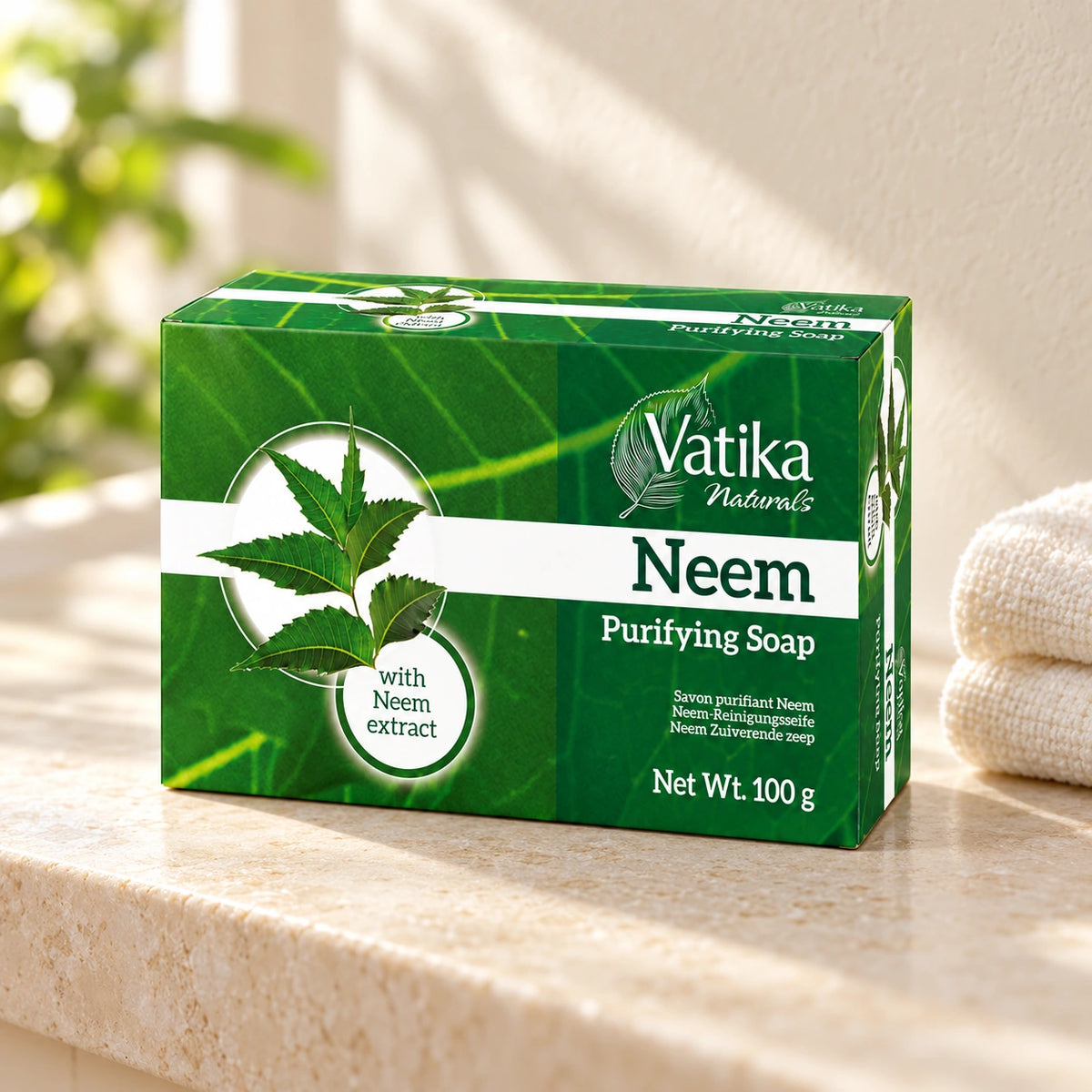 Vatika Naturals Neem Soap 100g on a limestone shelf with cream towels