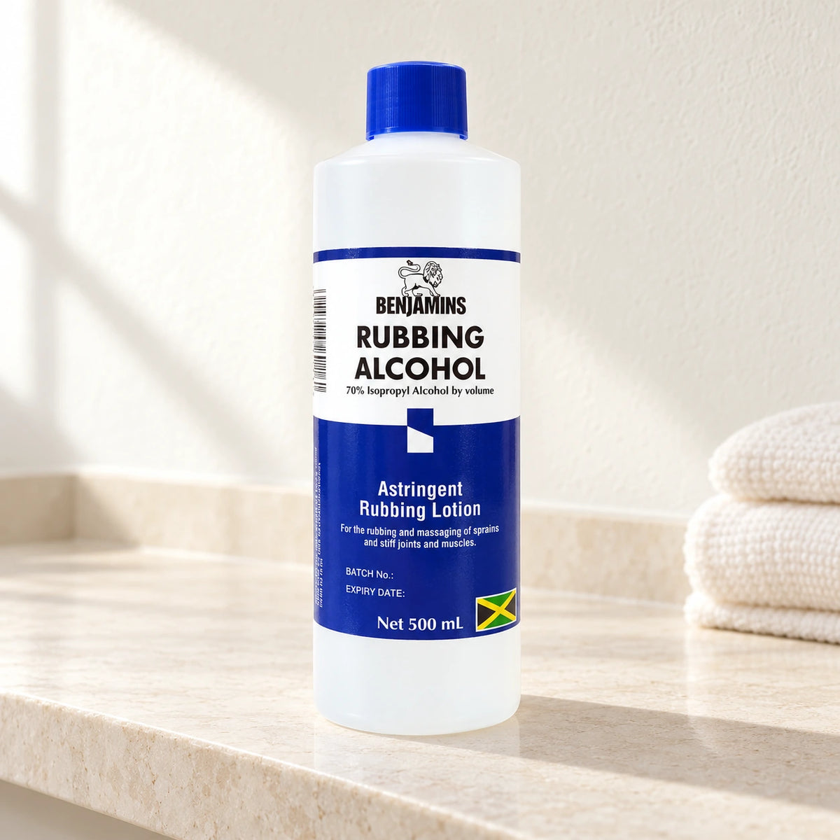 Benjamins Rubbing Alcohol 500ml bottle on a cream bathroom shelf