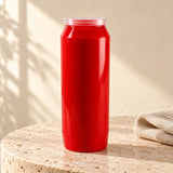 Red CBC 9-day sanctuary candle styled on pale stone with linen