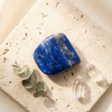 Tumbled Stone — Spiritual Wellness Flat Lay | Generated by Modelize