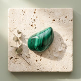 Tumbled gemstone — Spiritual Wellness Flat Lay | Generated by Modelize