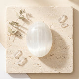 Tumbled Stone — Spiritual Wellness Flat Lay | Generated by Modelize