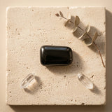 Tumbled Stone — Spiritual Wellness Flat Lay | Generated by Modelize