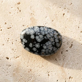 Tumbled Stone — Spiritual Wellness Flat Lay | Generated by Modelize