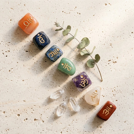 Engraved tumbled gemstone chakra set — Organic Lifestyle Flat Lay | Generated by Modelize