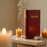 Windsor Text Bible – Red Hardback in a sacred altar setting