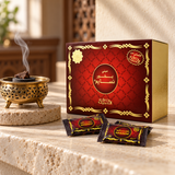 Nabeel Nasaem Mini Bakhoor box and wrapped pieces beside a brass incense burner on a stone console; burner sold separately