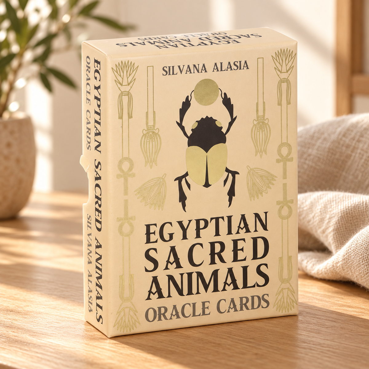 Egyptian Sacred Animals Oracle Cards by Silvana Alasia — styled lifestyle product photograph