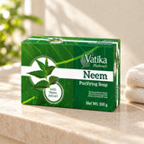 Vatika Naturals Neem Soap 100g on a limestone shelf with cream towels